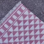 muted rose cotton dhurrie rug flatweave texture