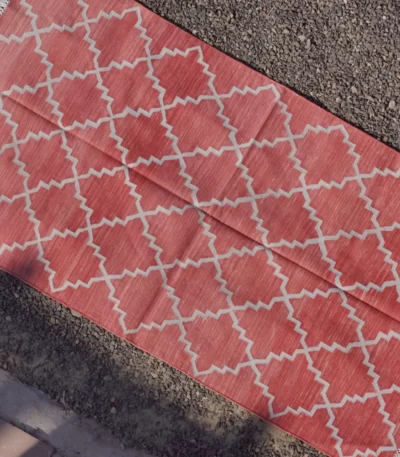 terracotta red cotton dhurrie rug flatweave texture