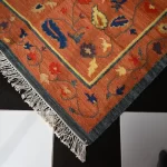 reversible rust orange wool rug handmade Jodhpur