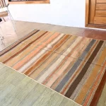 orange wool dhurrie rug flatweave texture