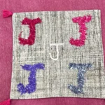 Handmade Textured Cushion Cover with Colorful J Design | Craftindo