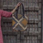 Handmade Multicolor Jute Tote Bag | Geometric Woven Shoulder Bag with Black Handles | Craftindo