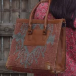 Handmade Rust & Blue Jute Tote Bag | Geometric Woven Handbag with Brown Handles | Craftindo